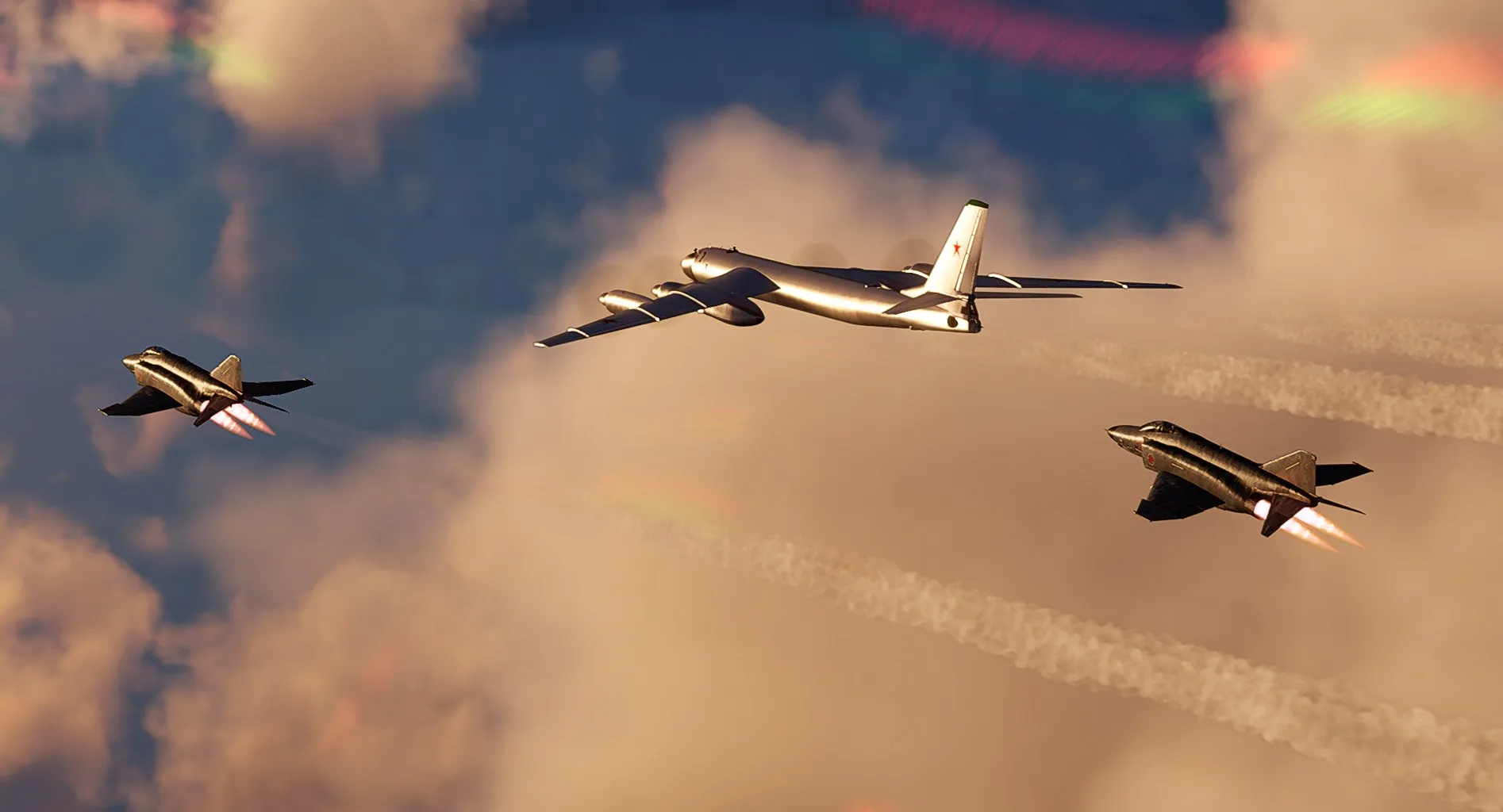 A large bomber flanked by two fighter jets with afterburners lit, flying through sunlit clouds.